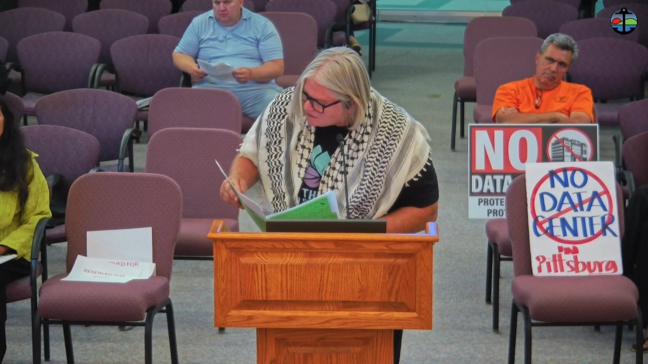 Cover image for Residents Pack Council Chambers to Demand Data Center Moratorium